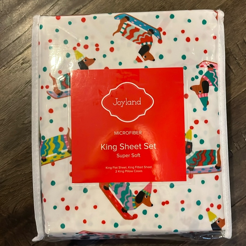 *NEW, never been opened” king sheet set with winter Daschund print!